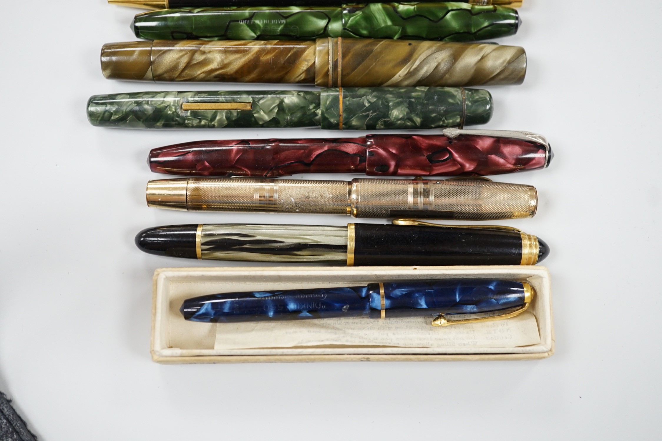 Assorted fountain pens including Conway Stewart and Cartier ballpoint pen